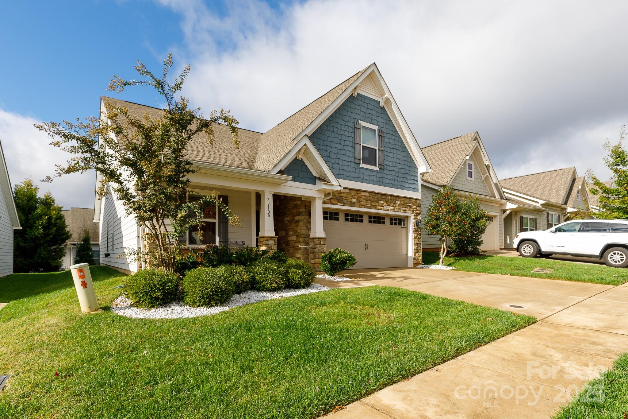50109 Robins Nest Lane Lancaster, SC 29720 - Photo 3 of 45 a view of a house with a yard and plants