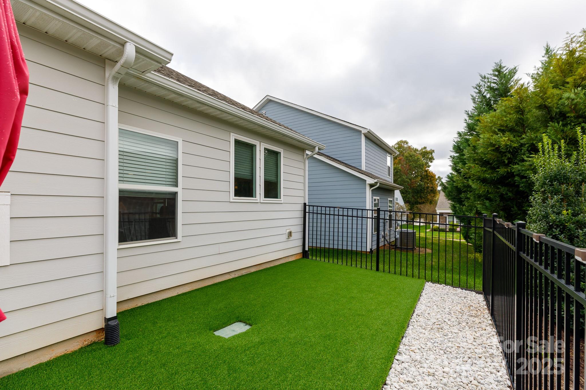 50109 Robins Nest Lane Lancaster, SC 29720 - Photo 33 of 45 a view of a backyard with a garden
