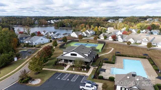an aerial view of a house with a ocean view