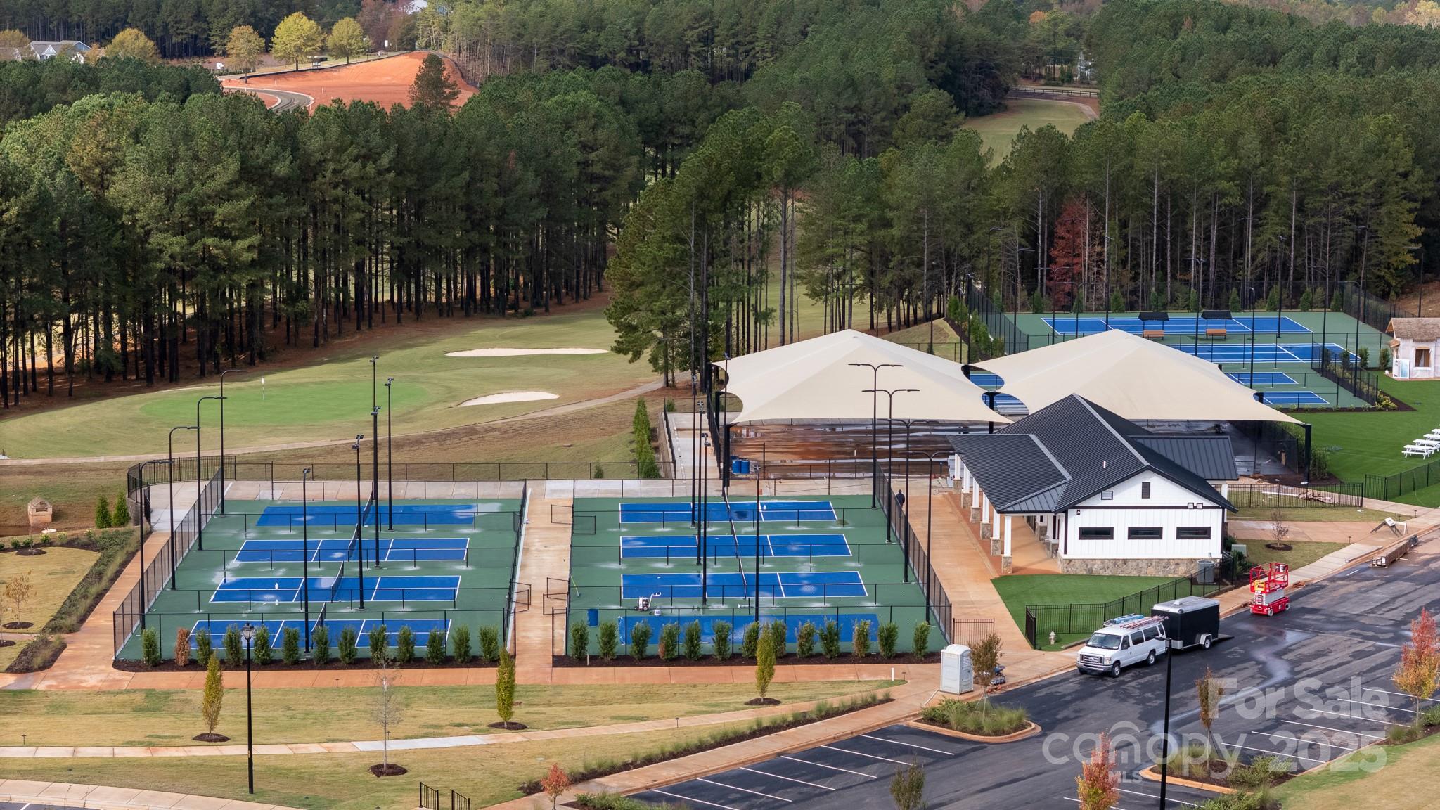 50109 Robins Nest Lane Lancaster, SC 29720 - Photo 44 of 45 a view of a tennis ground with large trees