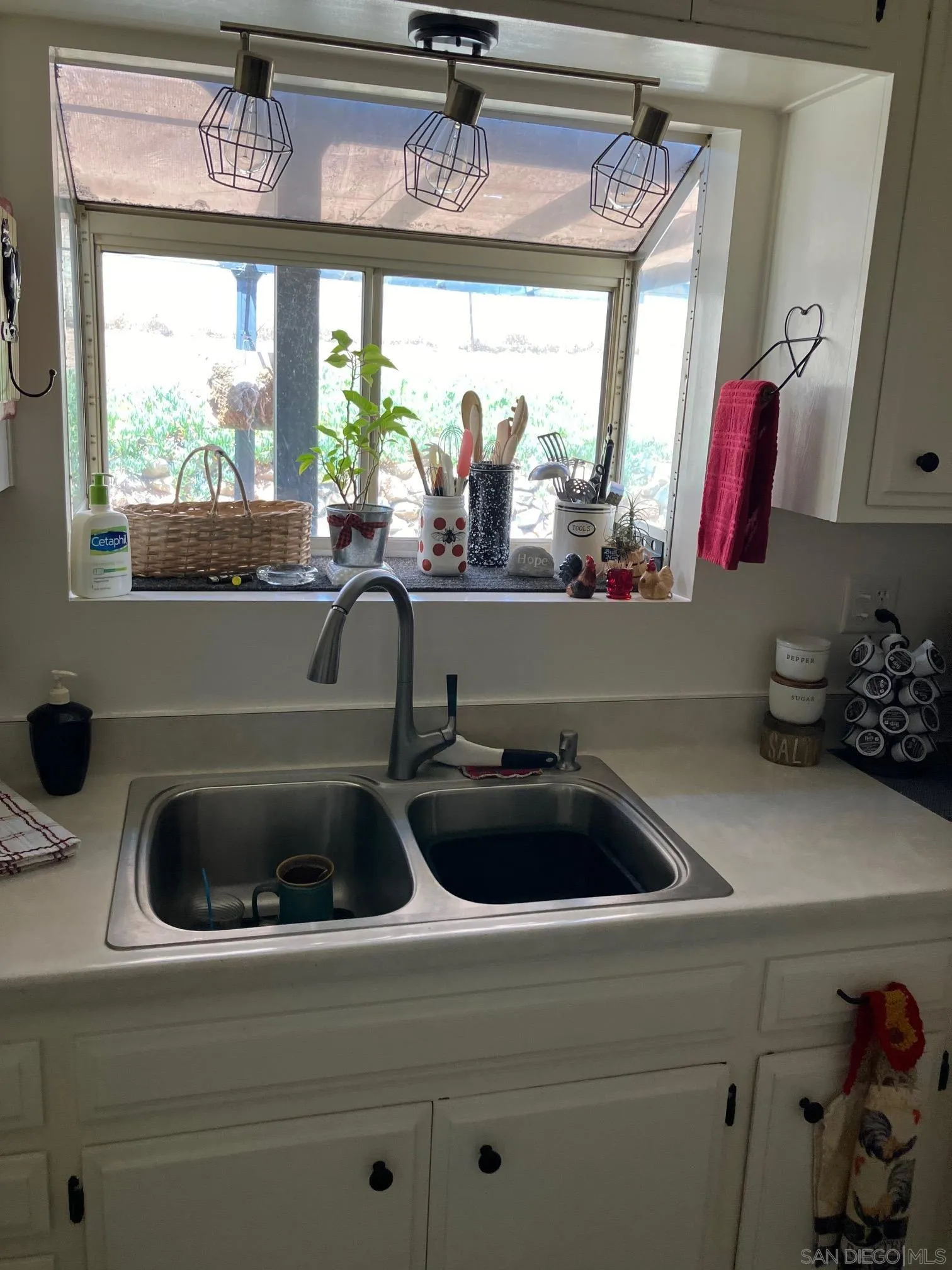 17066 Highway 94 Jamul, CA 91935 - Photo 12 of 23 a kitchen with a sink and a window