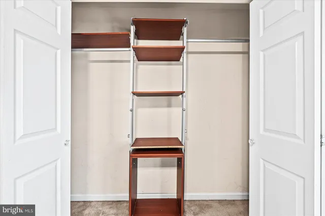 a room with a door and wooden floor