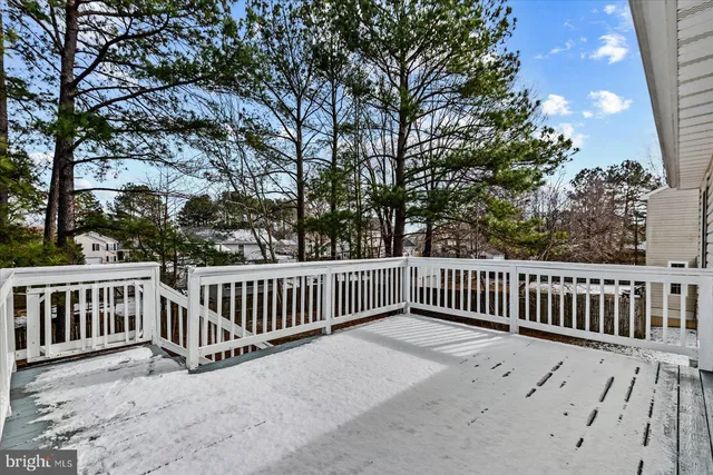 a view of deck with a trees