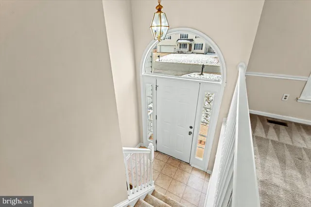 a view of a livingroom with white doors