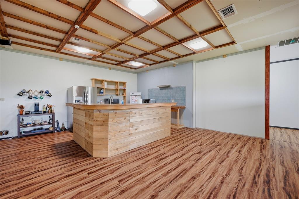 1464 Keyes Road Sherman, TX 75092 - Photo 11 of 29 a view of a room with wooden floor
