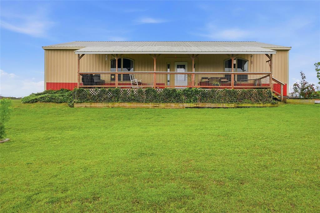 1464 Keyes Road Sherman, TX 75092 - Photo 2 of 29 a front view of a house with garden