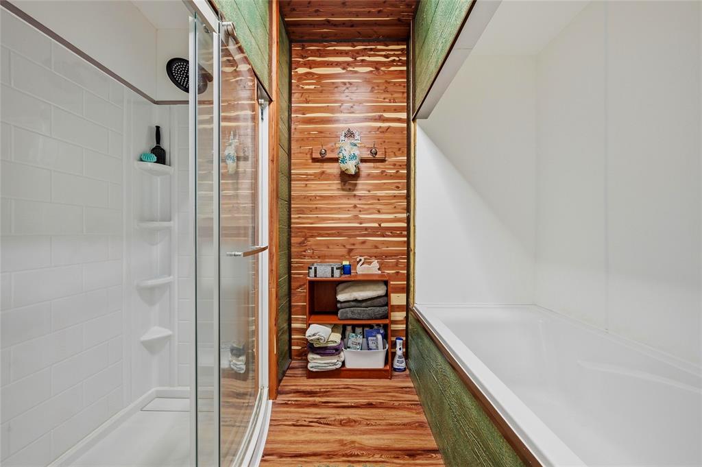 1464 Keyes Road Sherman, TX 75092 - Photo 24 of 29 a view of a hallway with wooden floor and staircase