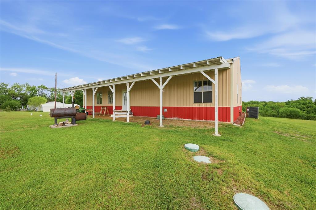 1464 Keyes Road Sherman, TX 75092 - Photo 26 of 29 a view of a house with backyard