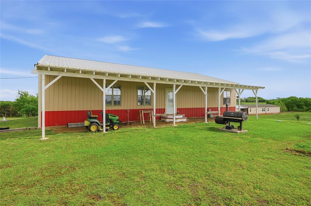 1464 Keyes Road Sherman, TX 75092 - Photo 28 of 29 a view of a house with backyard