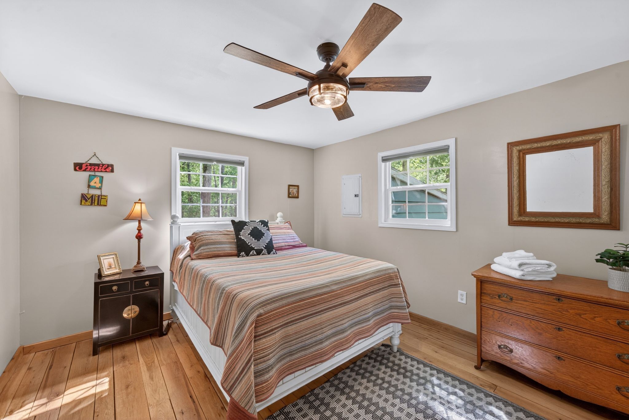 1030 Johnson Hollow Road McEwen, TN 37101 - Photo 11 of 78 a bedroom with a bed and a window