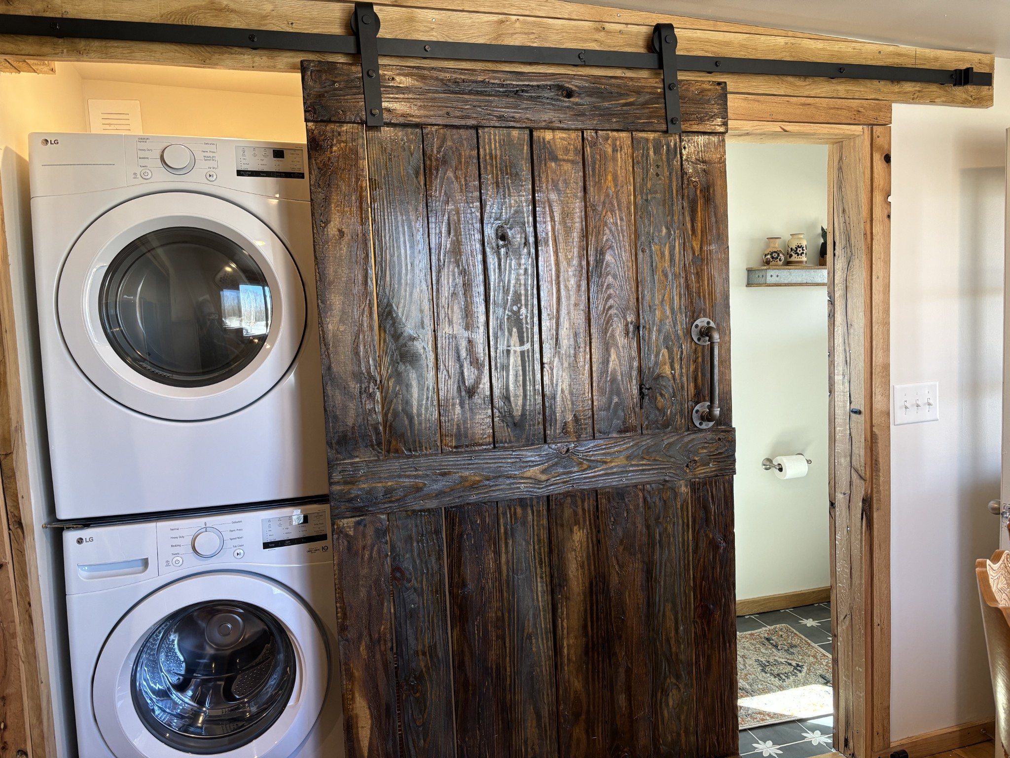 1030 Johnson Hollow Road McEwen, TN 37101 - Photo 45 of 78 a view of a hallway with washer and dryer