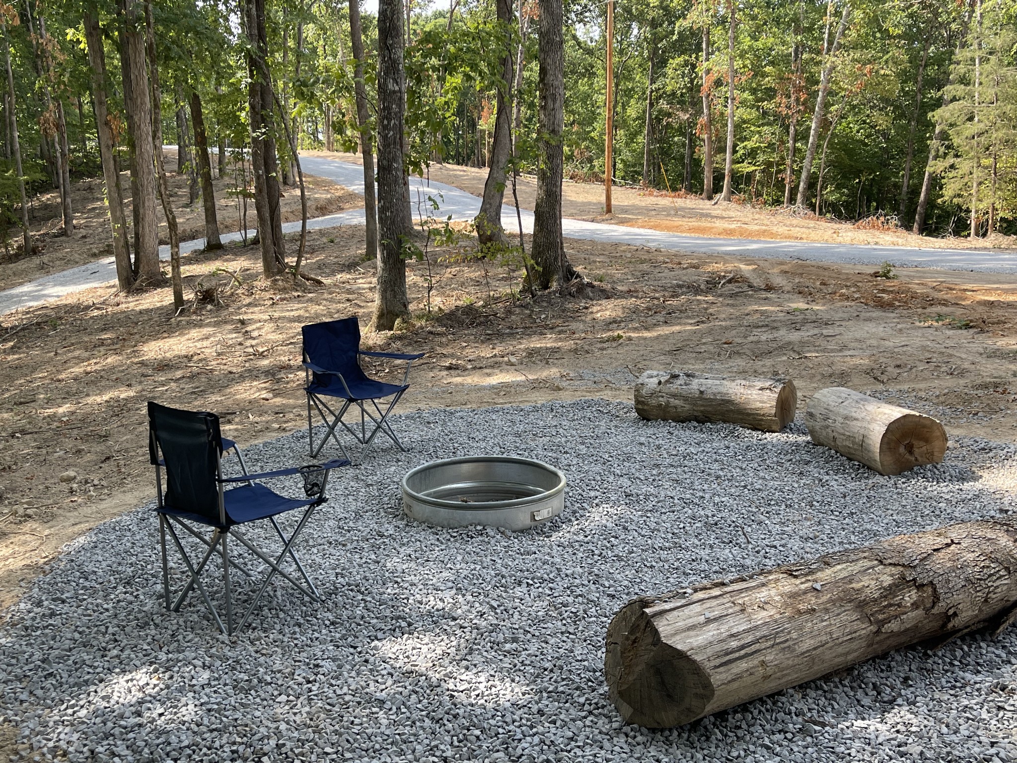 1030 Johnson Hollow Road McEwen, TN 37101 - Photo 71 of 78 a backyard of a house with barbeque oven and outdoor seating
