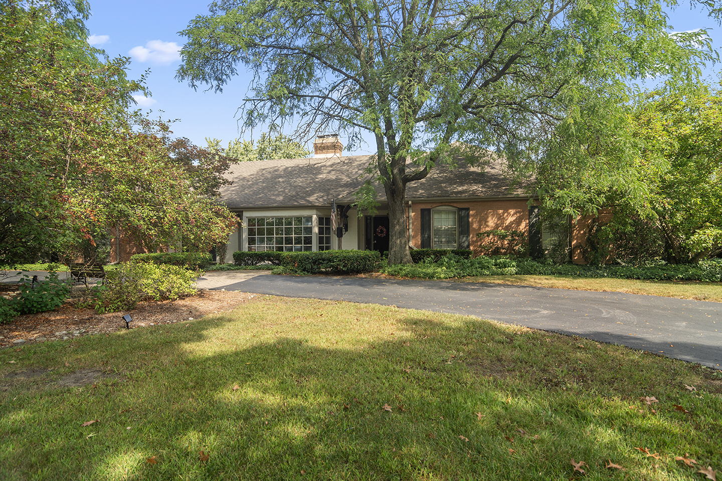 1766 Firth Road Inverness, IL 60067 - Photo 1 of 53 a front view of house with yard and green space