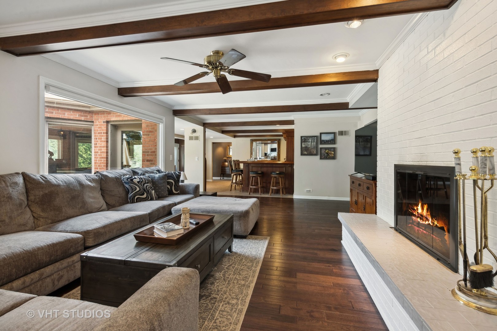 1766 Firth Road Inverness, IL 60067 - Photo 17 of 53 a living room with furniture and a fireplace