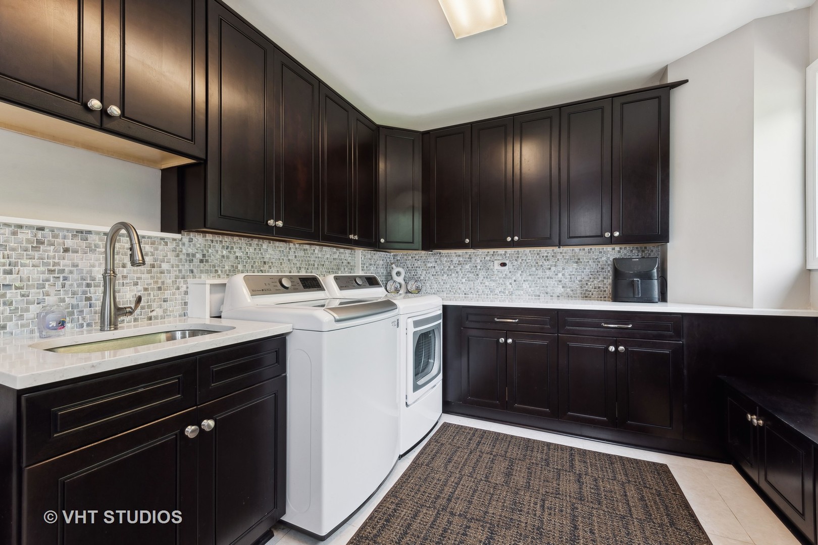 1766 Firth Road Inverness, IL 60067 - Photo 21 of 53 a kitchen with a sink stove and cabinets