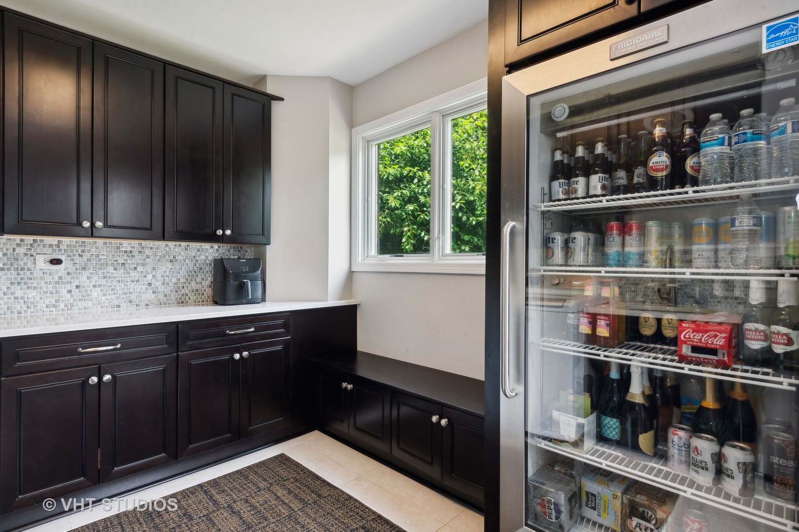 1766 Firth Road Inverness, IL 60067 - Photo 22 of 53 a kitchen with stainless steel appliances wooden cabinets and a counter top space