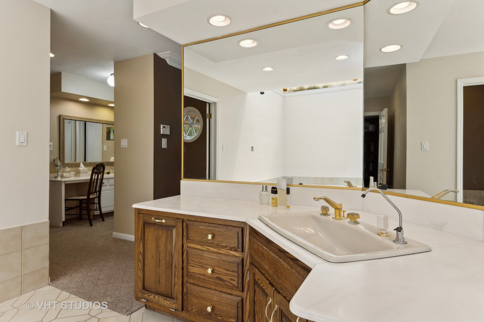 1766 Firth Road Inverness, IL 60067 - Photo 29 of 53 a bathroom with a sink double vanity and a mirror