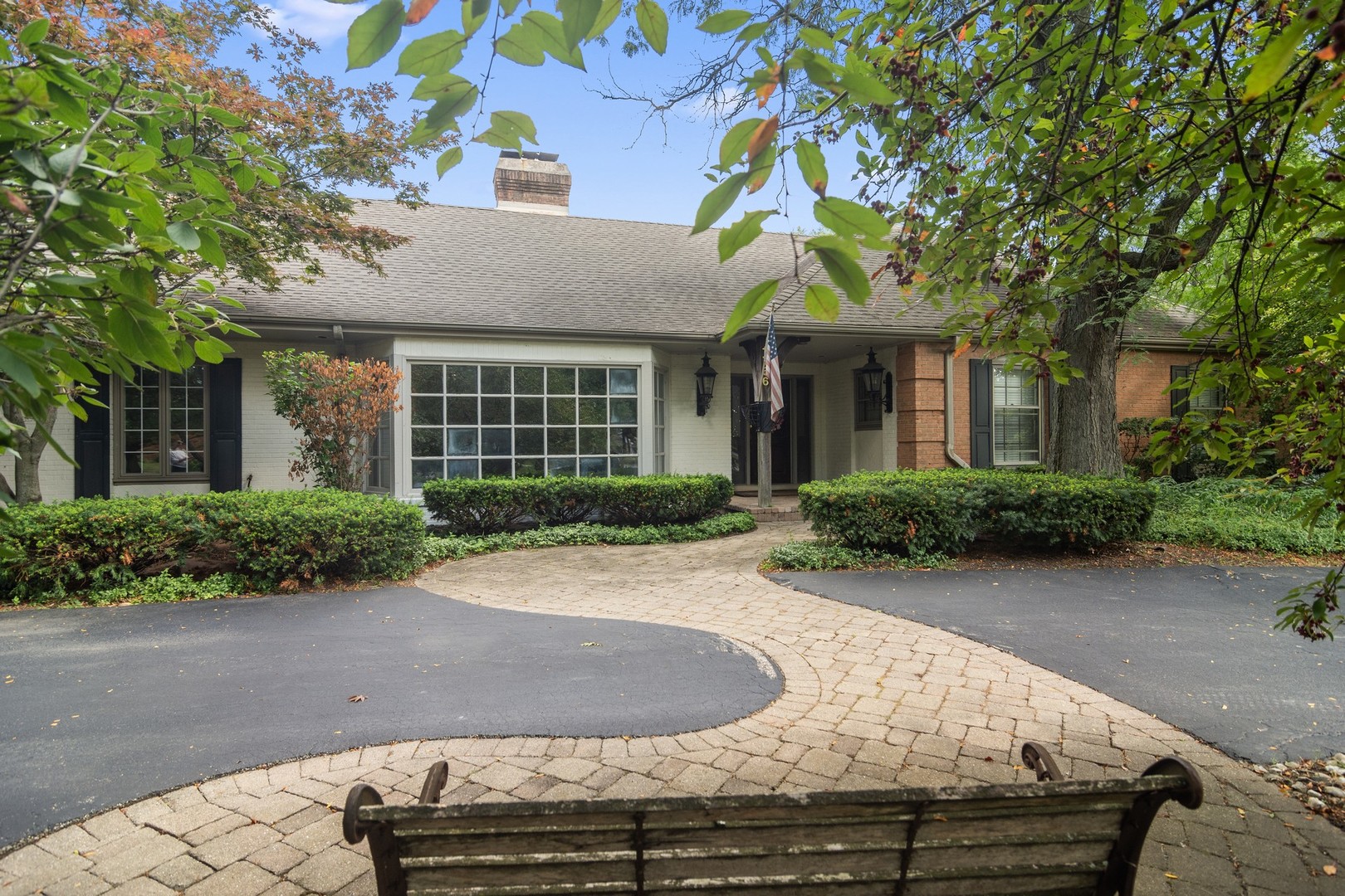 1766 Firth Road Inverness, IL 60067 - Photo 3 of 53 a front view of a house with garden