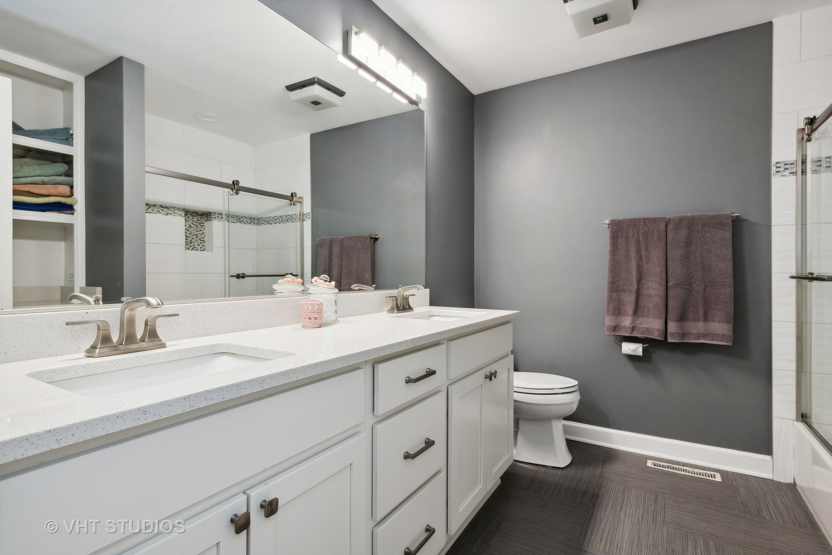 1766 Firth Road Inverness, IL 60067 - Photo 34 of 53 a bathroom with double sink and a toilet