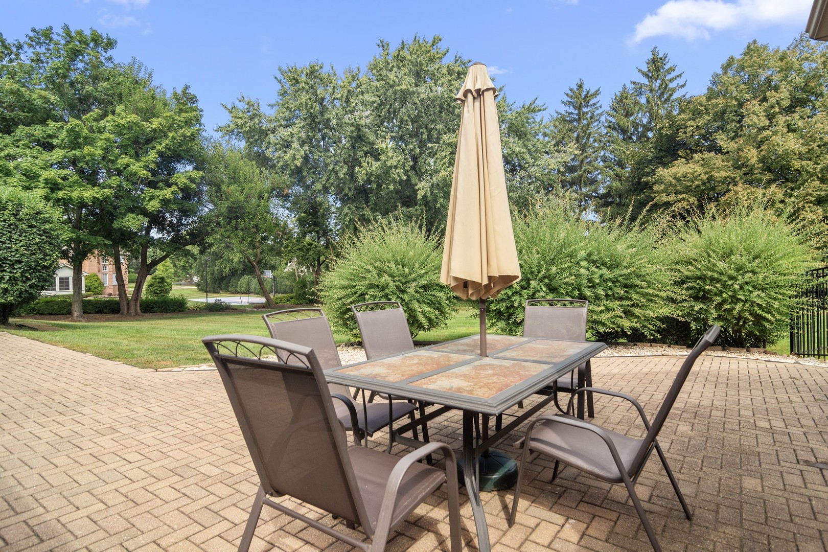 1766 Firth Road Inverness, IL 60067 - Photo 40 of 53 a view of a patio with a table and chairs