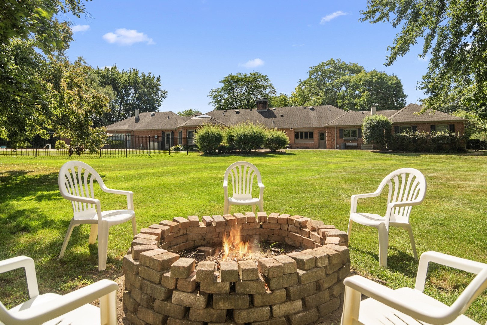 1766 Firth Road Inverness, IL 60067 - Photo 46 of 53 a front view of a house with garden and patio