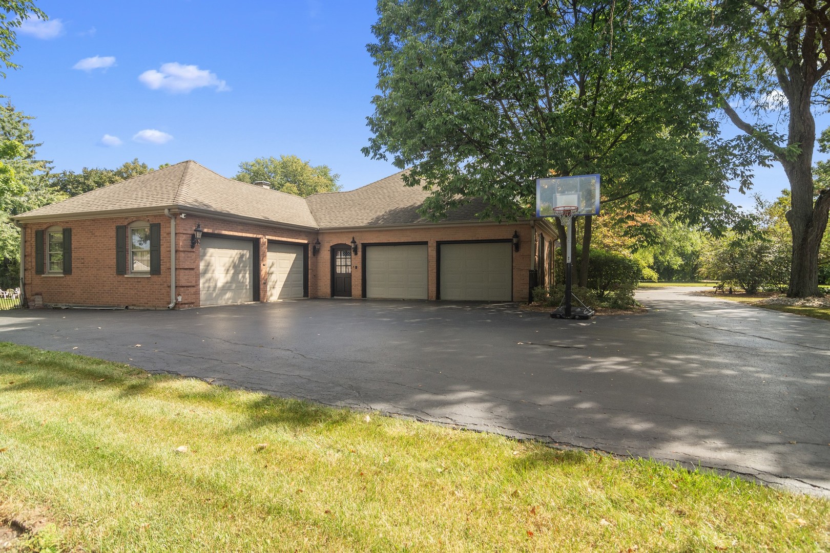 1766 Firth Road Inverness, IL 60067 - Photo 49 of 53 a view of a house with pool and a yard
