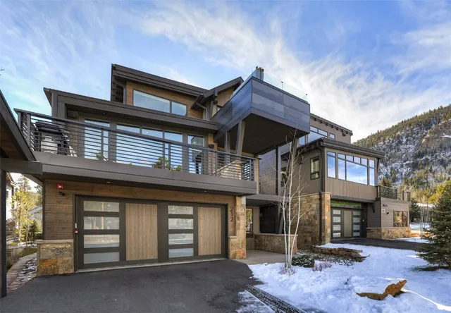 a front view of a house with a garage