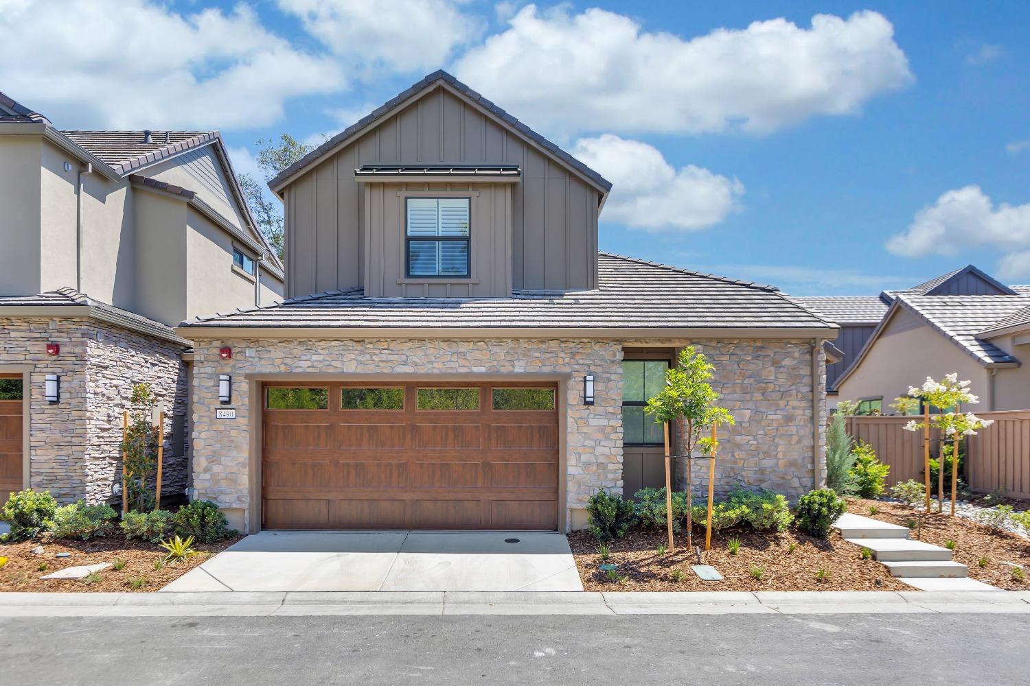 7110 Soleil Way Granite Bay, CA 95746 - Photo 1 of 13 a front view of a house with yard