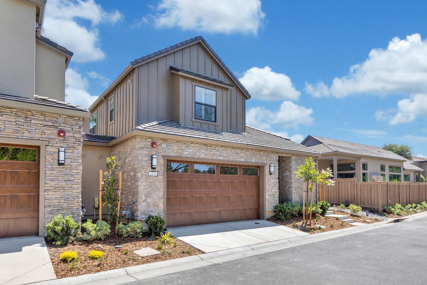 7110 Soleil Way Granite Bay, CA 95746 - Photo 2 of 13 a front view of a house with garden