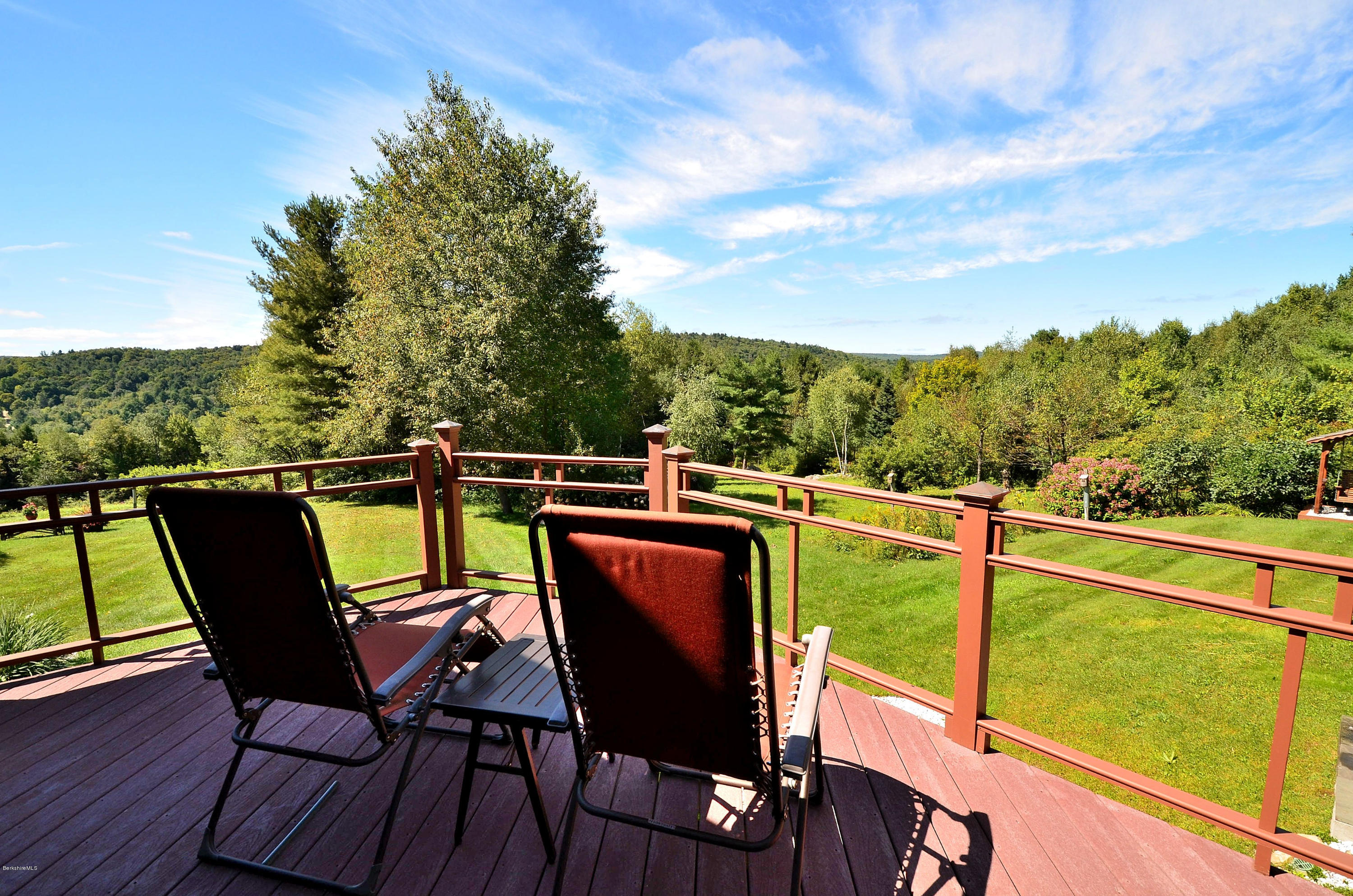 286 Johnson Hill Road Washington, MA 01223 - Photo 25 of 30 a view of a chairs and table on the deck