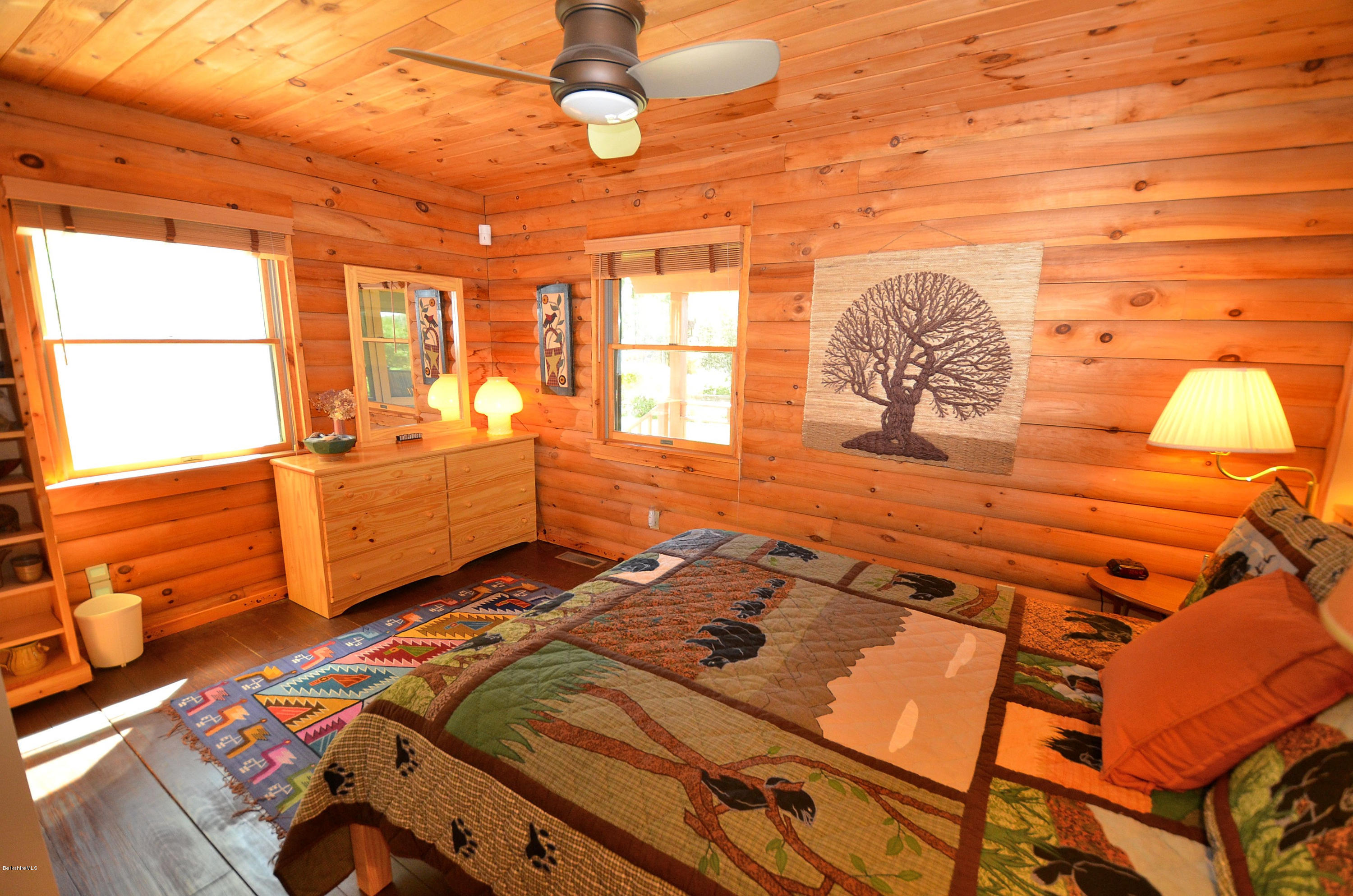 286 Johnson Hill Road Washington, MA 01223 - Photo 26 of 30 a bed sitting in a bedroom next to a window