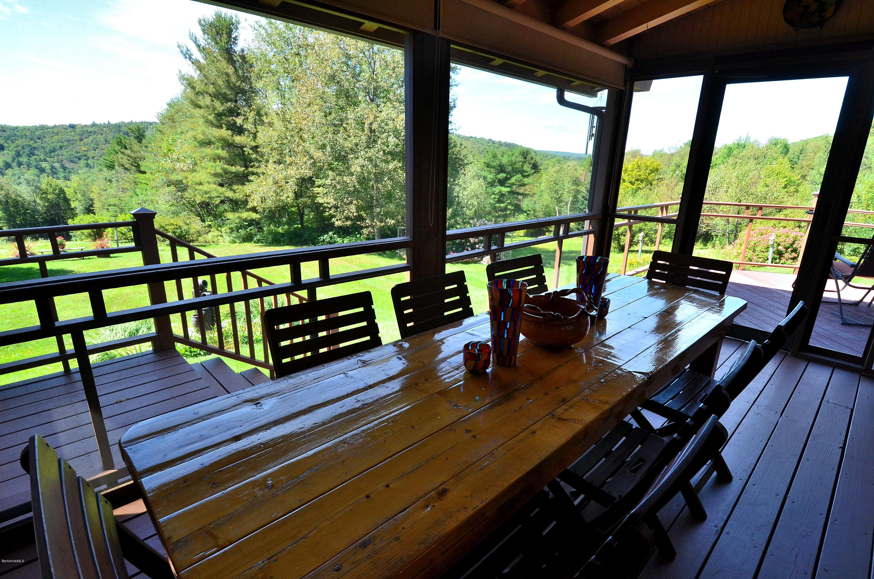 286 Johnson Hill Road Washington, MA 01223 - Photo 5 of 30 a view of a balcony with wooden floor