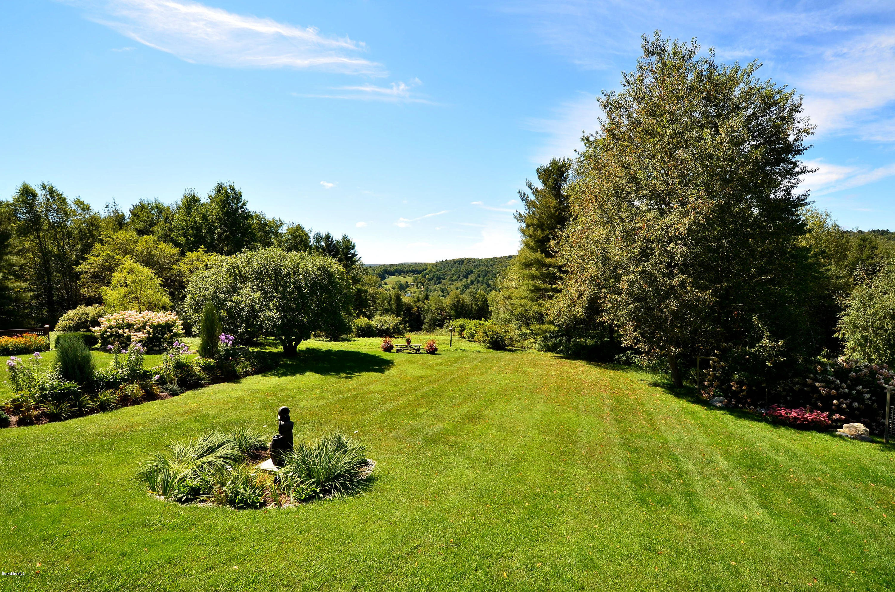 286 Johnson Hill Road Washington, MA 01223 - Photo 8 of 30 a swimming pool with trees in the background