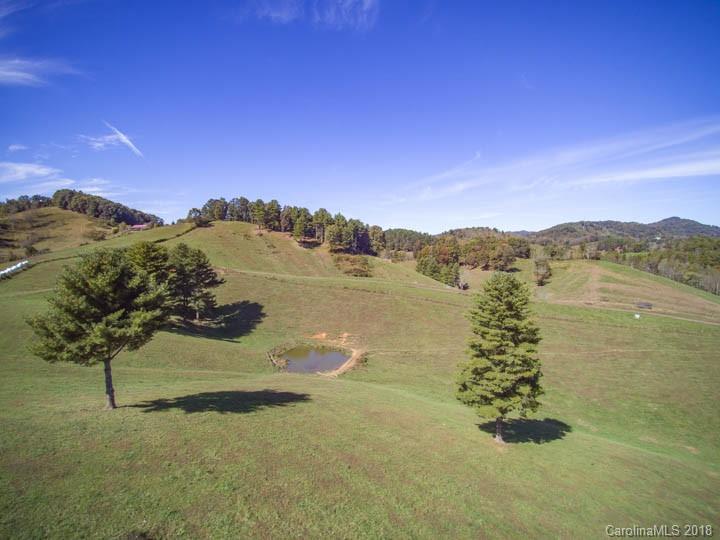 108 Howell Road Marshall, NC 28753 - Photo 2 of 26 a view of lake with mountain