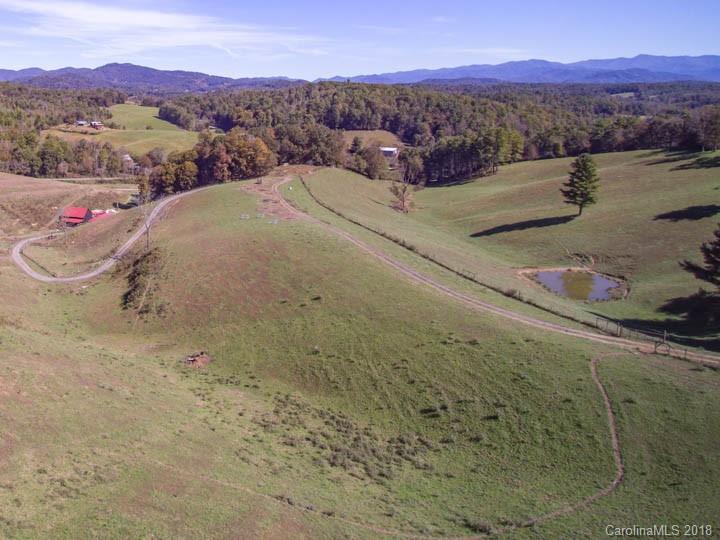 108 Howell Road Marshall, NC 28753 - Photo 11 of 26 a view of a dry yard with mountain