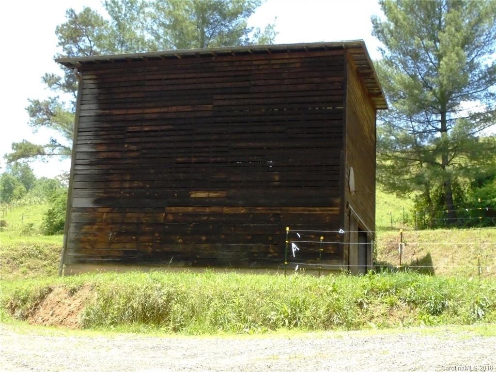 108 Howell Road Marshall, NC 28753 - Photo 18 of 26 a backyard of a house