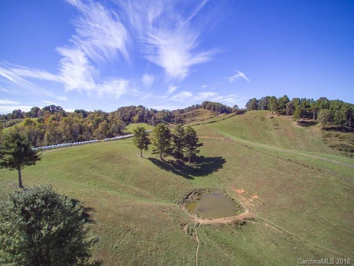 108 Howell Road Marshall, NC 28753 - Photo 3 of 26 a view of lake with mountain