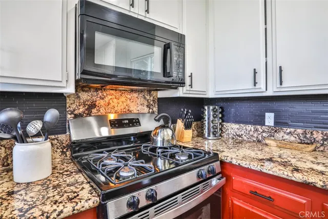 a view of balcony with furniture