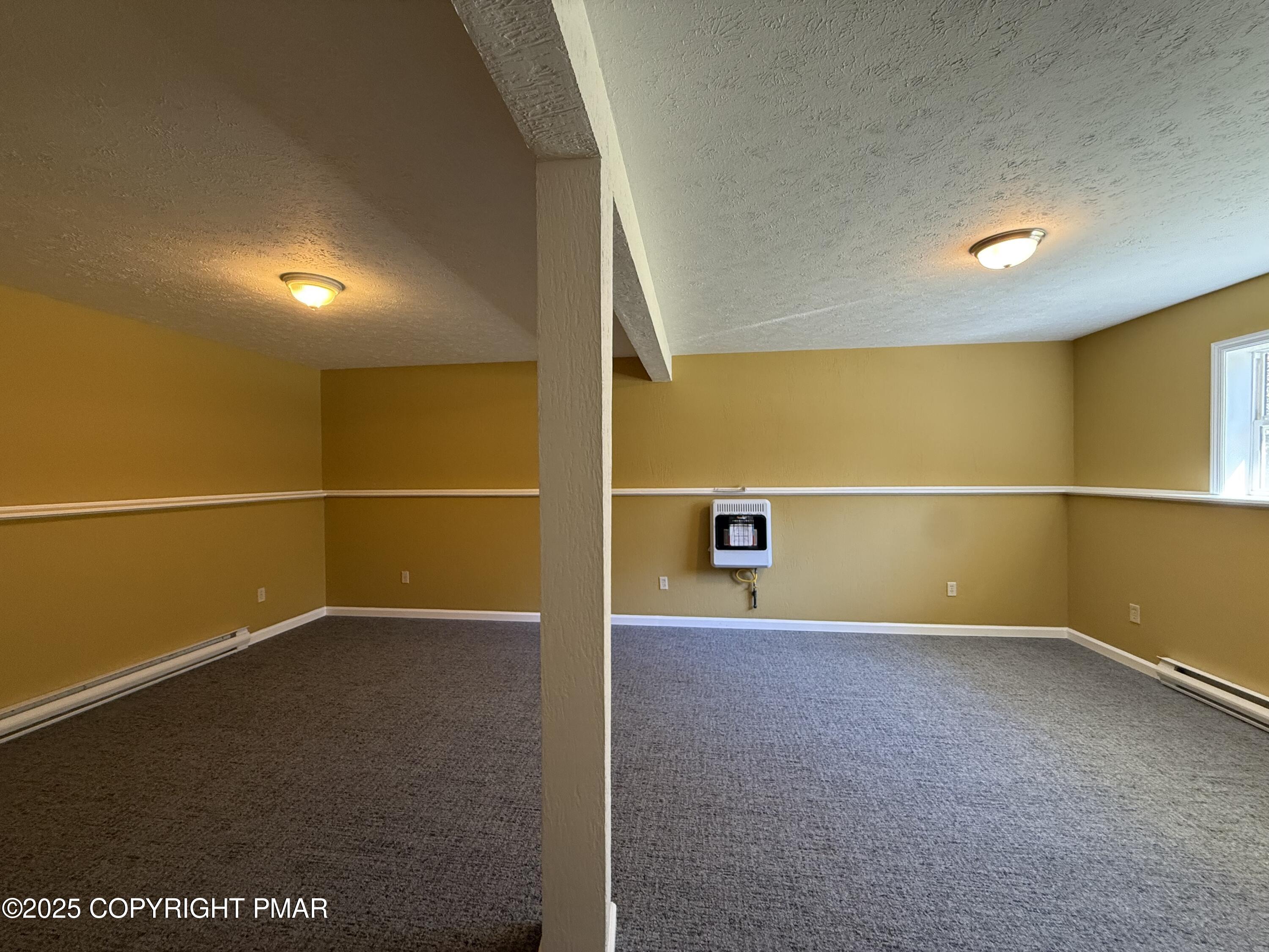 1753 Rolling Hills Drive Tobyhanna, PA 18466 - Photo 18 of 25 a view of an empty room with a window