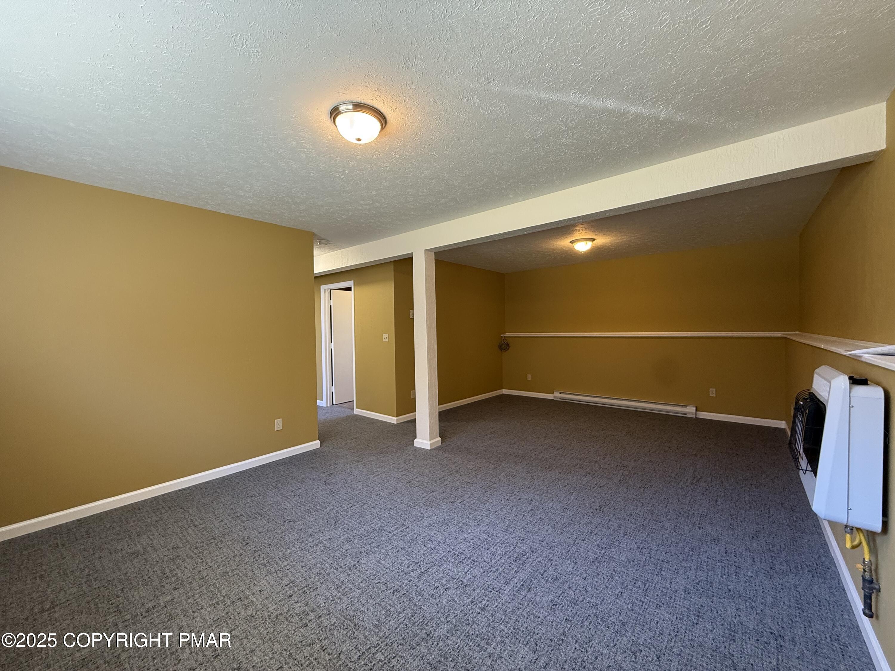 1753 Rolling Hills Drive Tobyhanna, PA 18466 - Photo 19 of 25 a view of an empty room