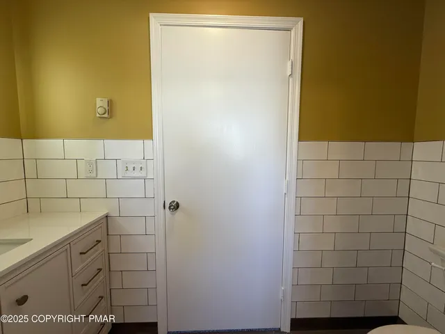 a bathroom with a sink and a vanity