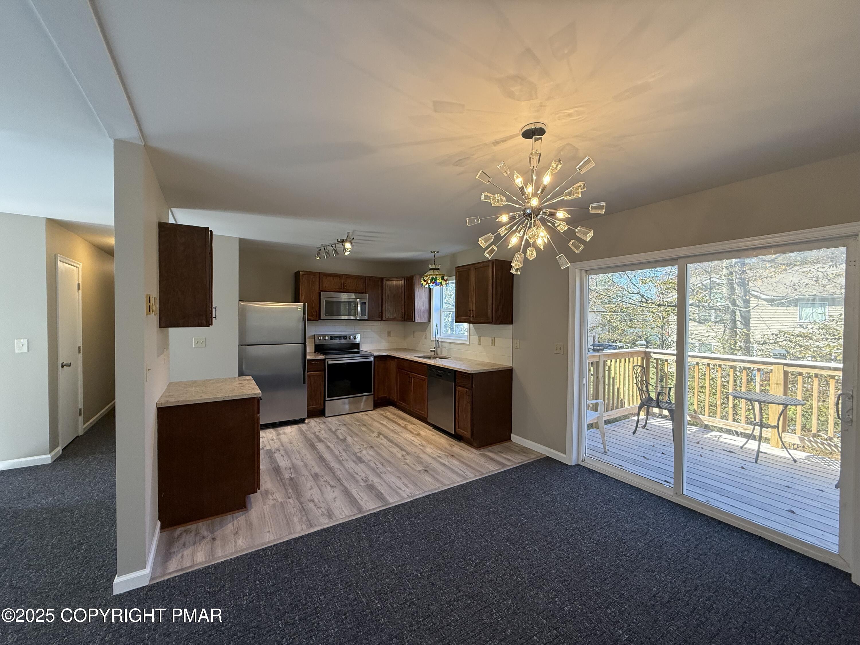 1753 Rolling Hills Drive Tobyhanna, PA 18466 - Photo 7 of 25 a living room with furniture and a large window