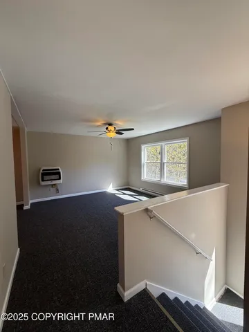 a bathroom with a sink toilet and a mirror