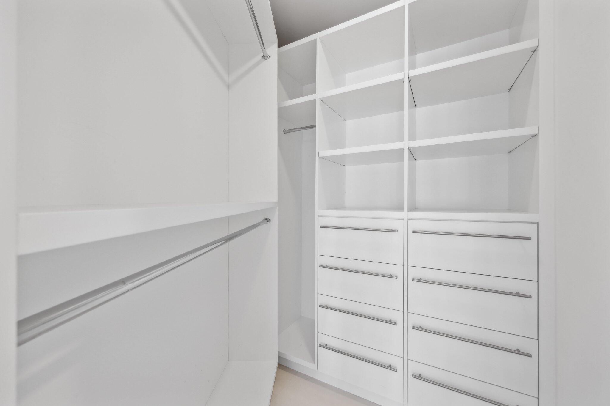 1000 South Ocean Boulevard, Unit 309 Boca Raton, FL 33432 - Photo 25 of 63 a view of walk in closet with empty racks