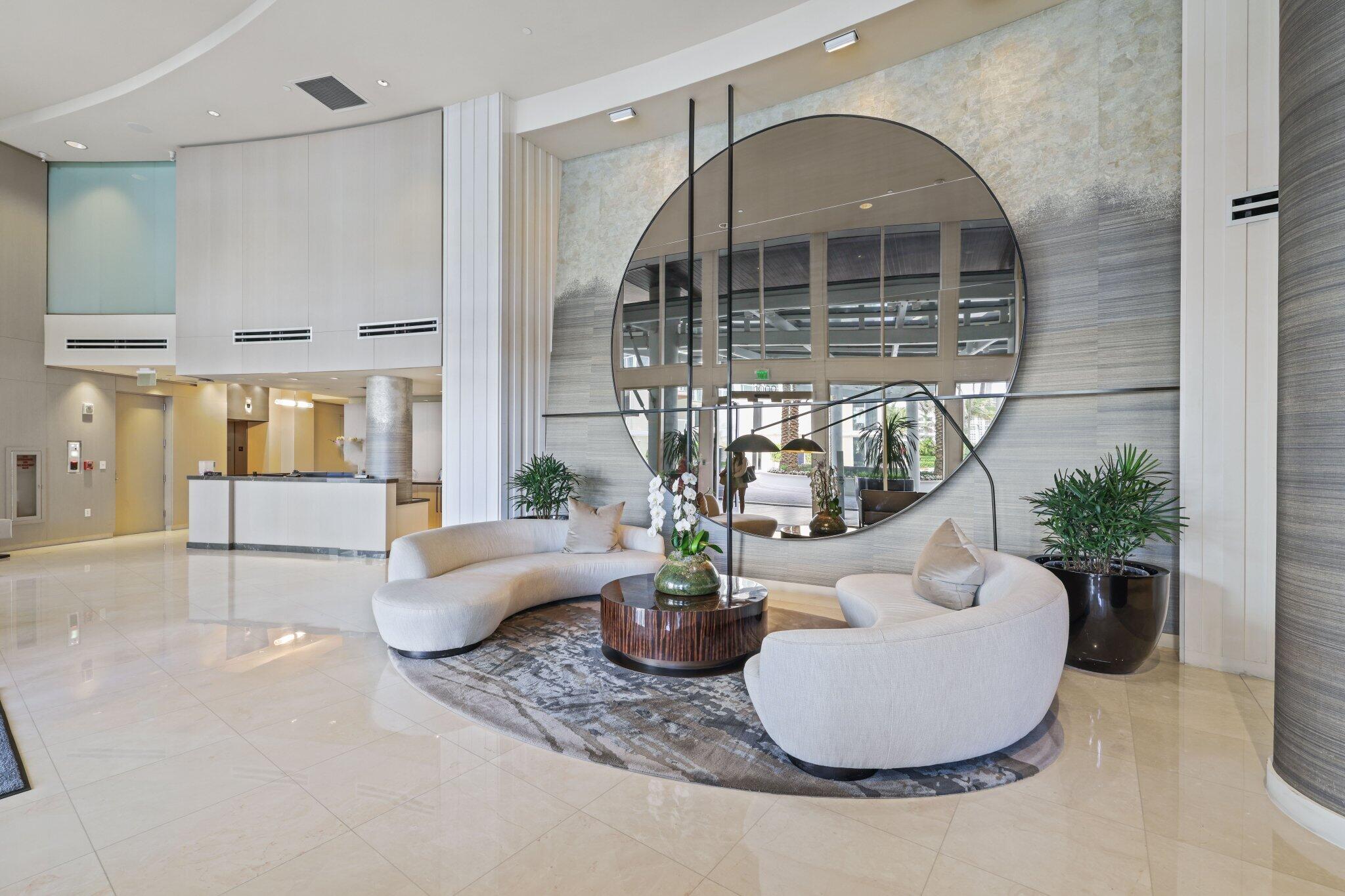 1000 South Ocean Boulevard, Unit 309 Boca Raton, FL 33432 - Photo 39 of 63 a view of living room filled with furniture and a potted plant
