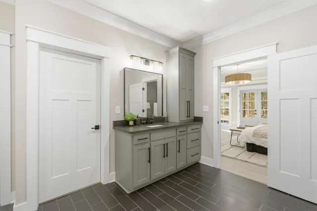 a bathroom with a bathtub and a sink