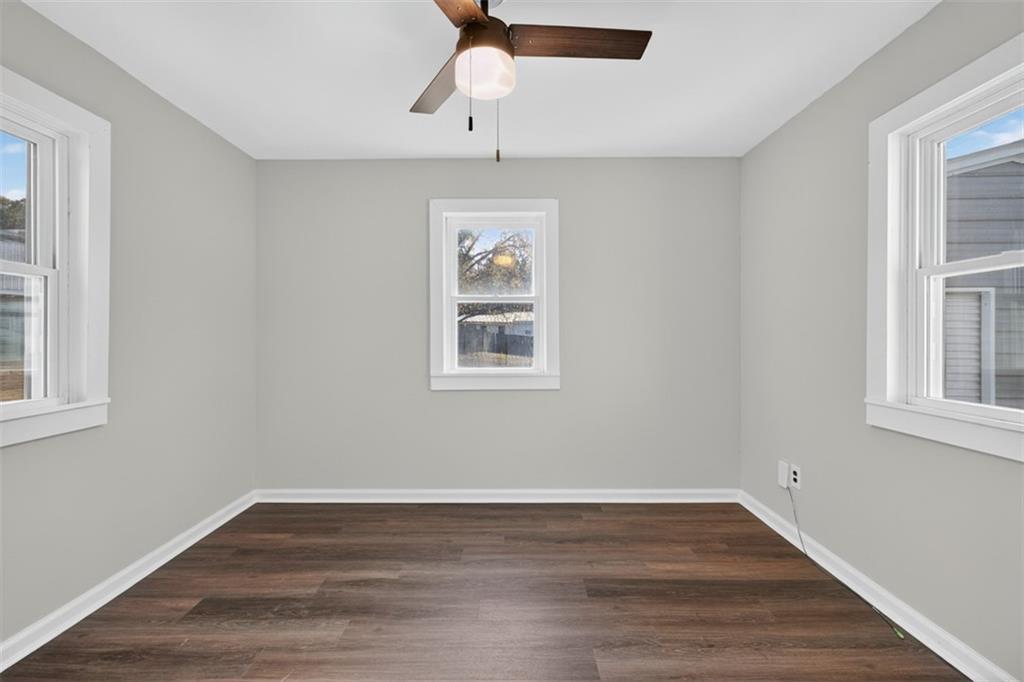 132 Victory Drive Monroe, GA 30655 - Photo 20 of 36 a view of a room with wooden floor and windows