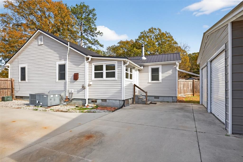 132 Victory Drive Monroe, GA 30655 - Photo 27 of 36 a view of a house with snow on the road