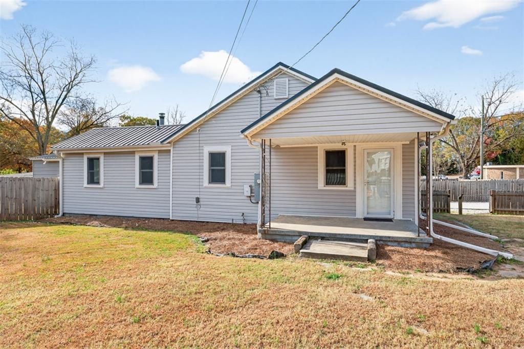 132 Victory Drive Monroe, GA 30655 - Photo 31 of 36 a view of a house with a yard