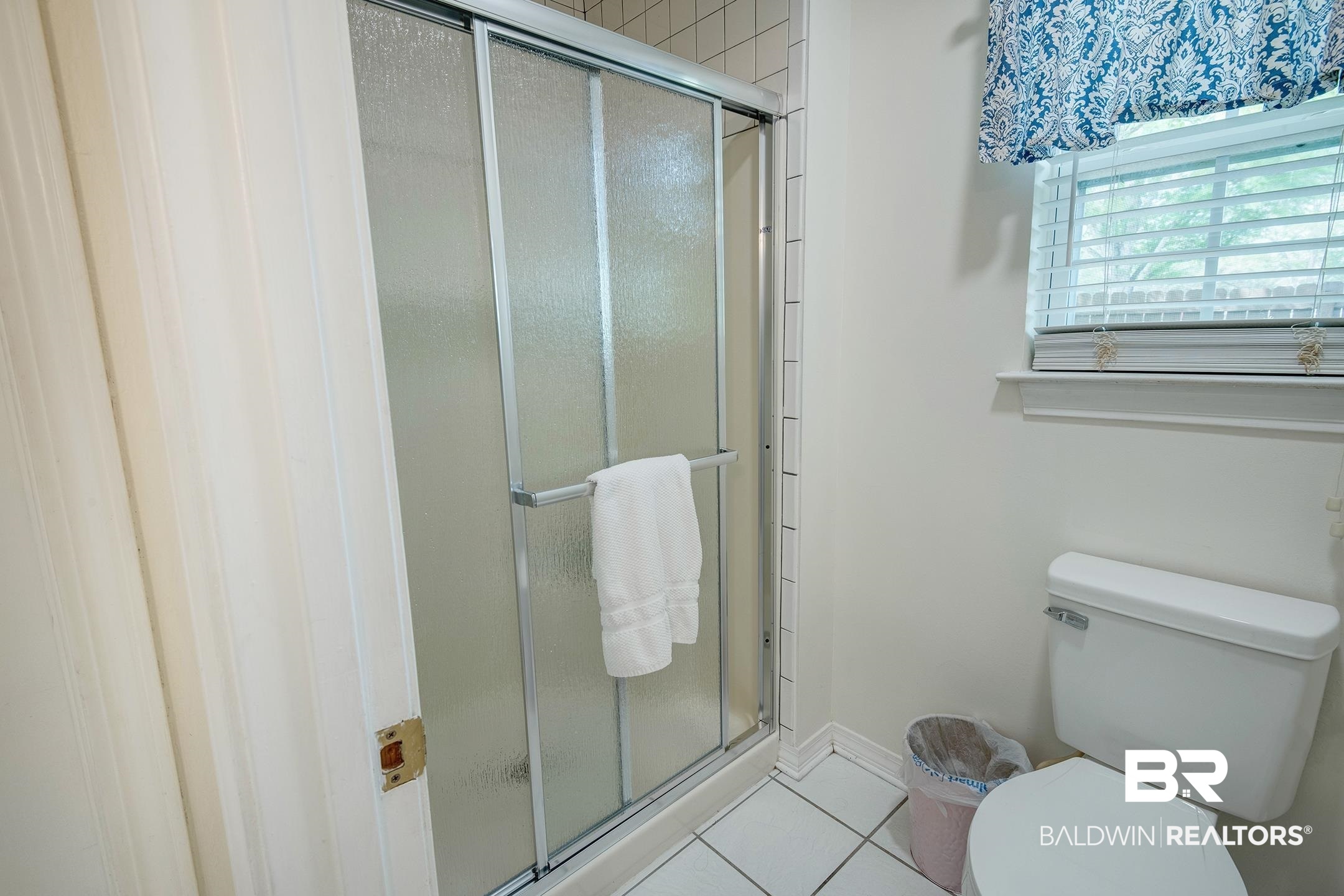 10093 Willis Road Foley, AL 36535 - Photo 12 of 33 Full bathroom featuring a shower stall and light tile patterned floors